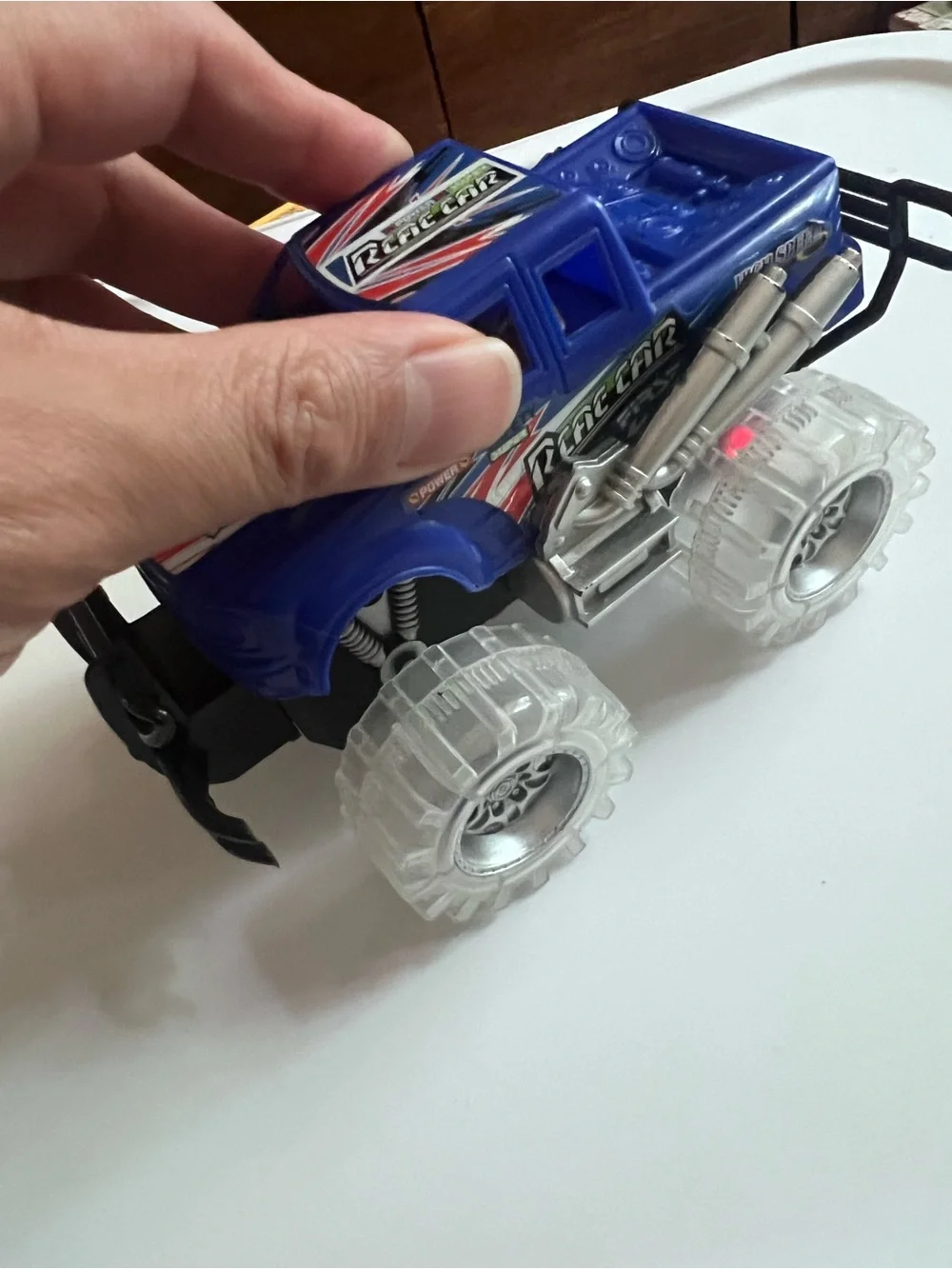 Light-Up Blue Monster Truck Toy – Friction Powered Push & Go Car with LED Tires